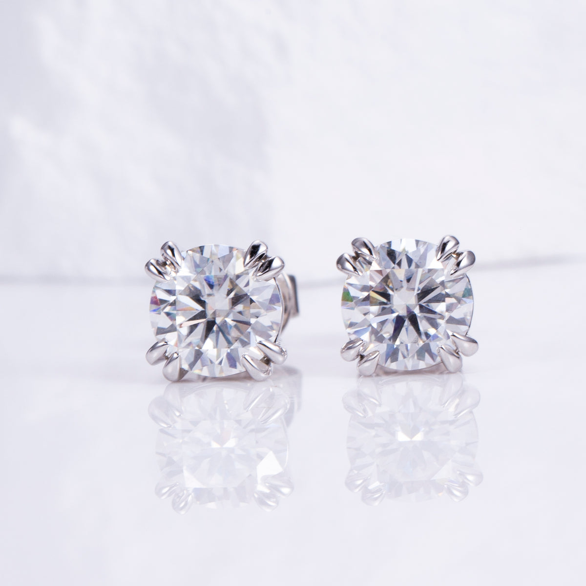 Lys Double Claw Stud Earrings